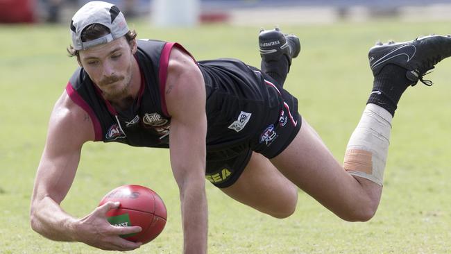 Dylan Roberton takes a tumble. Picture: Michael Klein