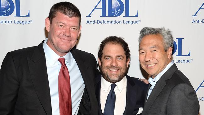 Kevin Tsujihara, right, with James Packer, left and Brett Ratner. Pic: WireImage