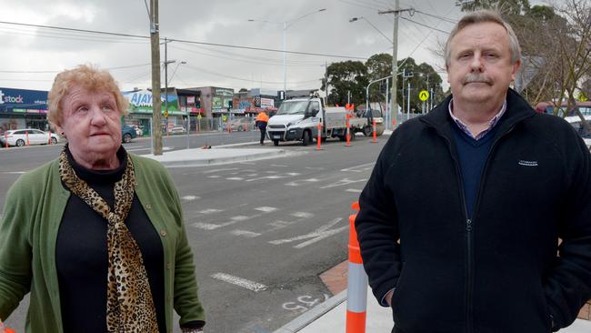 Heathmont Flowers’ Helen Brown and Barclays Cafe’s Steve Wilson are frustrated at the delays in finishing safety upgrades at Heathmont Village’s carpark and at traffic lights on Canterbury Rd. Picture: STEVE TANNER.