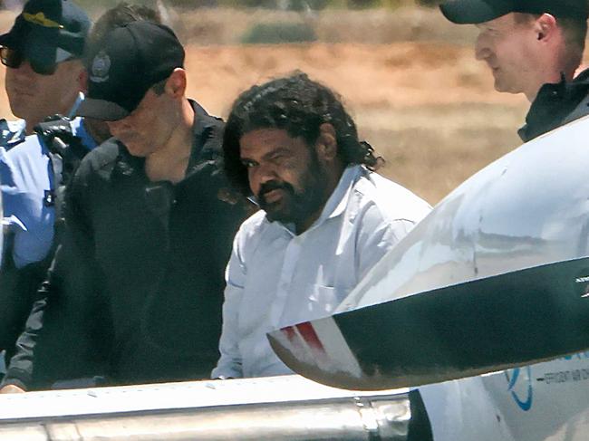 Terence Darrell Kelly being taken to prison in Perth. He has pleaded guilty to kidnapping Cleo Smith. Picture: Colin Murty