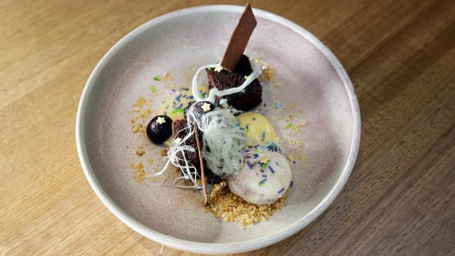 The Shoreline Motor Hotel’s Kids Brownie consists of a chocolate brownie with warm custard, ice cream, Persian fairy floss and cherries.