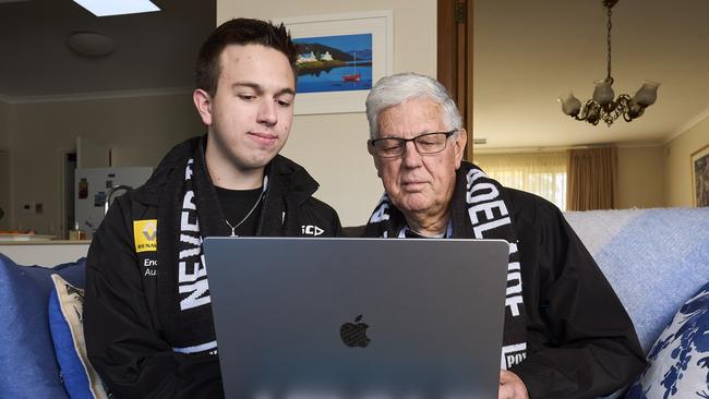 Josh Rogers with his grandfather, Kent Rogers at home in Coromandel Valley, where they managed to purchase preliminary final AFL tickets online. Picture: Matt Loxton