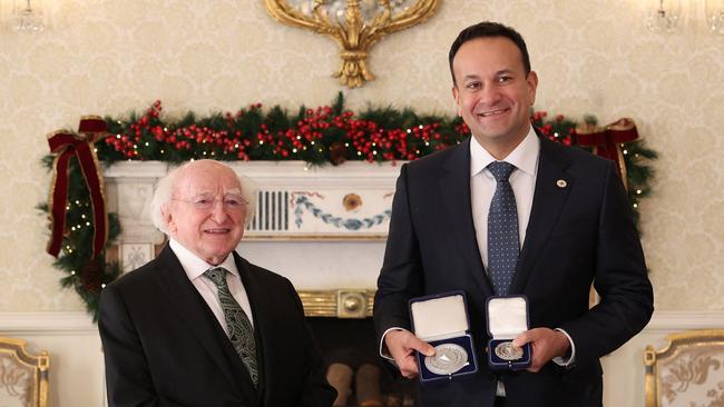 Leo Varadkar receives the seals of office from President Michael D. Higgins in Dublin on Saturday. Picture: AFP