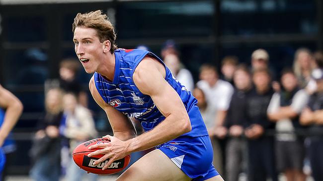 AFL. North Melbourne hold a simulation practice game at Arden St. Matt Whitlock takes possession of the ball going forward. Picture: Ian Currie