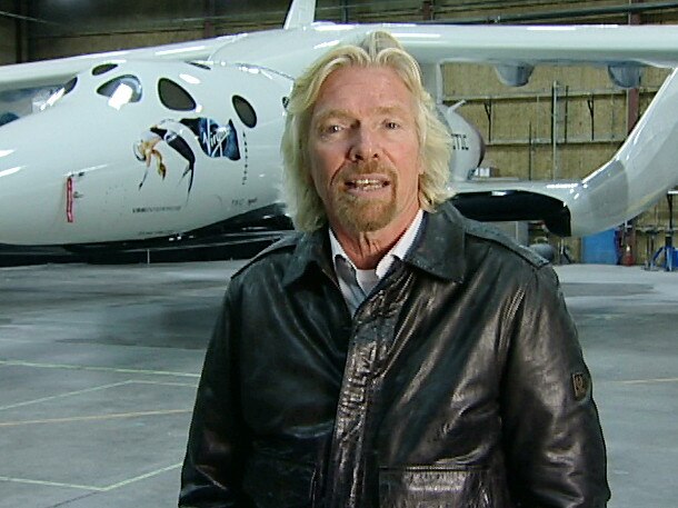 Sir Richard Branson unveiling Virgin Galactic SpaceShipTwo at the Mojave Air and Space Port in California, December 2009. Of the delays in the venture, Branson says “space is hard”, and safety must remain paramount.