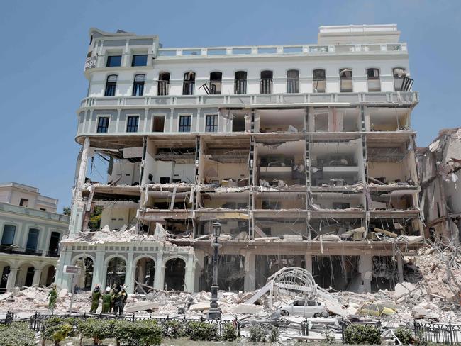 View of the Saratoga Hotel after a powerful explosion in Havana, on May 6, 2022. - Eight people were killed and about 30 hurt in a powerful explosion Friday that partly destroyed a five-star hotel in central Havana, the Cuban government said, adding the blast was likely caused by a gas leak. (Photo by Adalberto ROQUE / AFP)