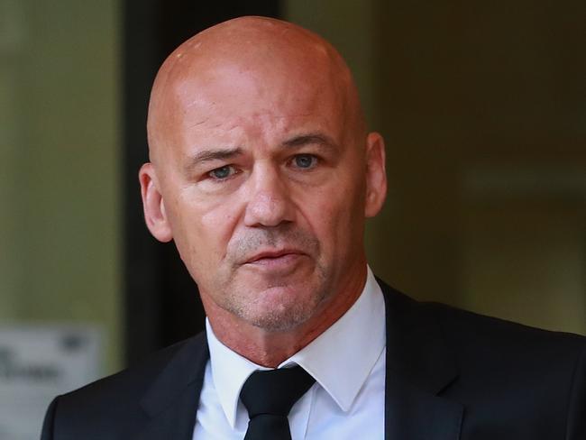 NSW detective Gary Jubelin leaving the Downing Centre Courts, today, after being found guilty of illegally recording during the William Tyrrell investigation.Picture:Justin Lloyd