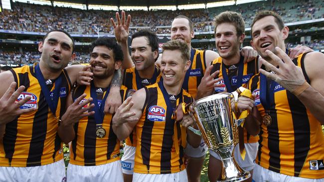 Hawthorn players celebrate the club’s 2015 premiership. Picture: Wayne Ludbey