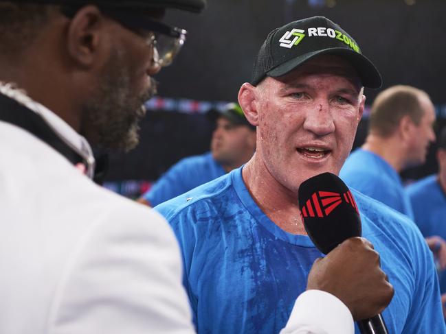 SYDNEY, AUSTRALIA - DECEMBER 16: Paul Gallen is interviewed  after victory over Mark Hunt during the Main Event fight prior to the light-middleweight World Title elimination bout between Tim Tszyu and Bowyn Morgan at Bankwest Stadium on December 16, 2020 in Sydney, Australia. (Photo by Brett Hemmings/Getty Images)