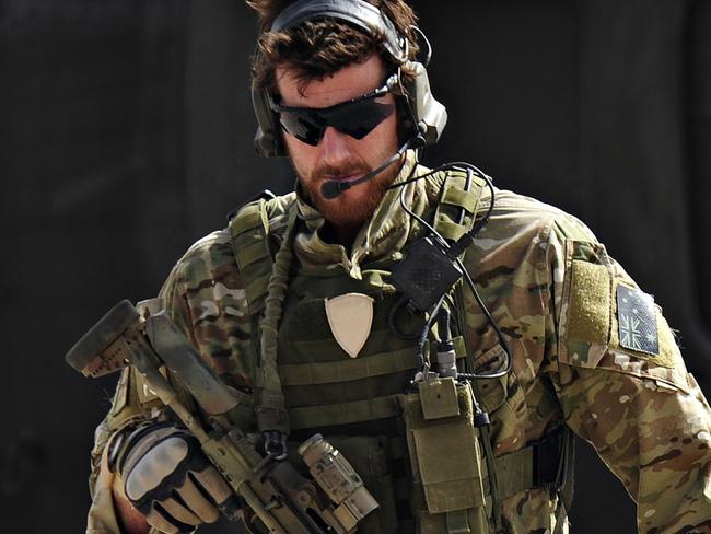 Australian Army soldier Corporal Benjamin Roberts-Smith, VC, MG, with the Special Operations Task Group, moves away from a United States UH-60 Black Hawk helicopter during preparations for the Shah Wali Kot Offensive in southern Afghanistan. *** Local Caption *** In June 2010, Afghan National Security Forces (ANSF) partnered with Australian special forces from the Special Operations Task Group to conduct a deliberate operation to clear a Taliban insurgent stronghold in the Shah Wali Kot region of northern Kandahar province.  The Shah Wali Kot Offensive comprised synchronised and deliberate clearance operations involving Australian commandos combined with a number of surgical helicopter-born assaults from Special Air Service (SAS) troops on key targets.  Removing Taliban insurgents from Afghan communities allows the Government of Afghanistan to establish a presence and gain the trust of the community to provide them with necessary infrastructure and security that was not provided by the insurgents.  The Shah Wali Kot Offensive was part of Australiaâs contribution to Operation Hamkari, an ISAF operation to extend the Government of Afghanistanâs influence into Kandahar City in southern Afghanistan. Picture: Department of Defence