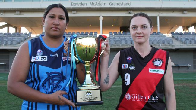 Rovers co-captain Delsey Campbell and West’s captain Rachel Devine with the 2024 CAFL premiership cup at Traeger Park, Alice Springs, September 2024. Picture: Gera Kazakov