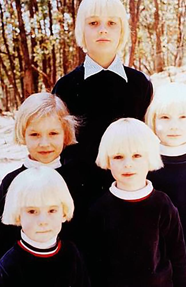 The 28 stolen children were dressed identically with matching bleached blonde hair.