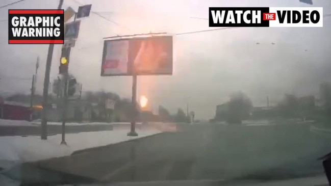 Driver navigates explosions in Kharkiv, Ukraine