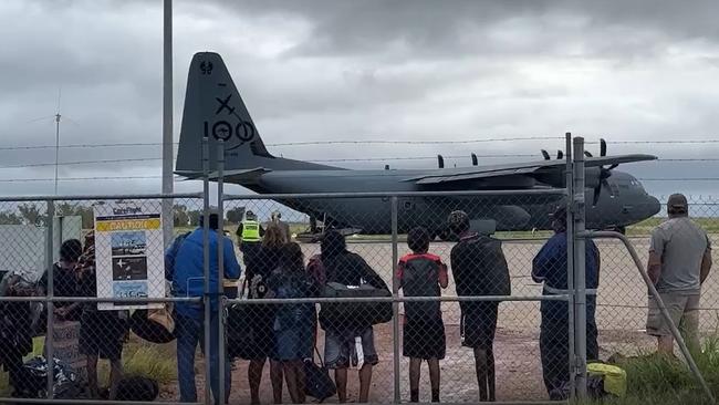 Residents in Kalkarindji wait to board evacuation flights run by the ADF. Picture: Supplied