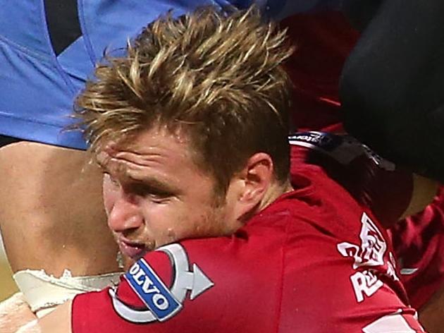 PERTH, AUSTRALIA - JULY 05: Sam Wykes of the Force gets tackled by Rob Simmons and Ben Lucas of the Reds during the round 18 Super Rugby match between the Western Force and the Queensland Reds at nib Stadium on July 5, 2014 in Perth, Australia. (Photo by Paul Kane/Getty Images)