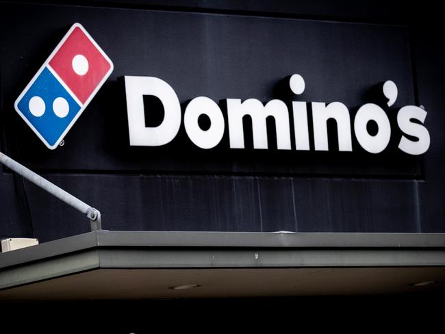 Signs in Domino’s store spark outrage