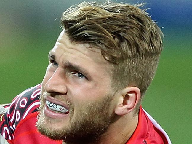 MELBOURNE, AUSTRALIA - JUNE 27: Dom Shipperley of the Reds is seen to by medical staff during the round 17 Super Rugby match between the Rebels and the Reds at AAMI Park on June 27, 2014 in Melbourne, Australia. (Photo by Robert Prezioso/Getty Images)