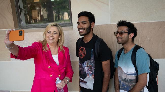 Ms Palaszczuk taking selfies with students. Picture: Sarah Marshall