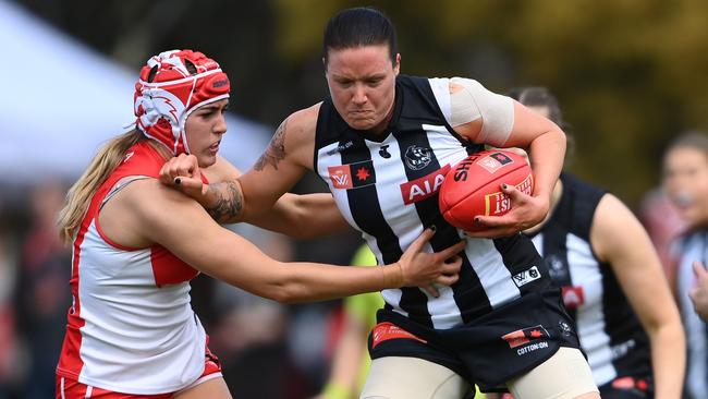 Stacey Livingstone tries to shrug a tackle. Picture: Quinn Rooney/Getty Images