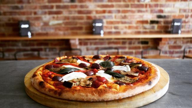 A wood oven pizza from Sneaky's Restaurant in Angle Vale. Picture: Sneaky's Restaurant