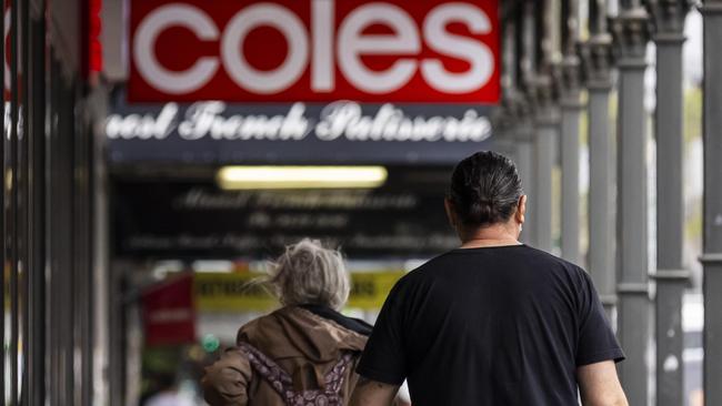 MELBOURNE, AUSTRALIA - NewsWire Photos October 15, 2021:  A person is seen carrying a Coles bag in Richmond, Melbourne, Victoria. Picture: NCA NewsWire / Daniel Pockett