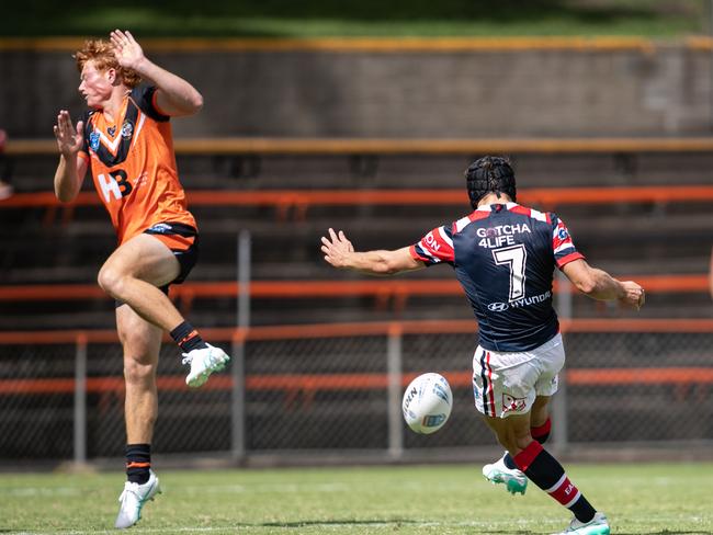 Toby Rodwell kicks the winning field goal. Picture: Julian Andrews