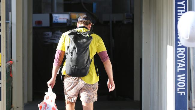 Workers arriving on The Jewel site yesterday afternoon on day two of turmoil at the site where workers and contractors are walking off the job due to uncertainty and a lack of communication. Picture Glenn Hampson