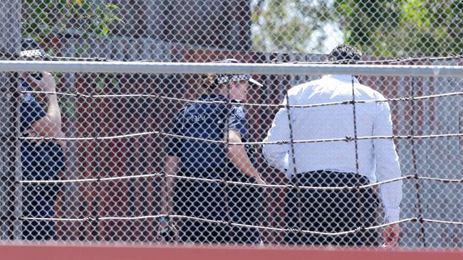 Police at Dreamworld on the Thunder River Rapids ride after the tragedy. Photo Steve Pohlner