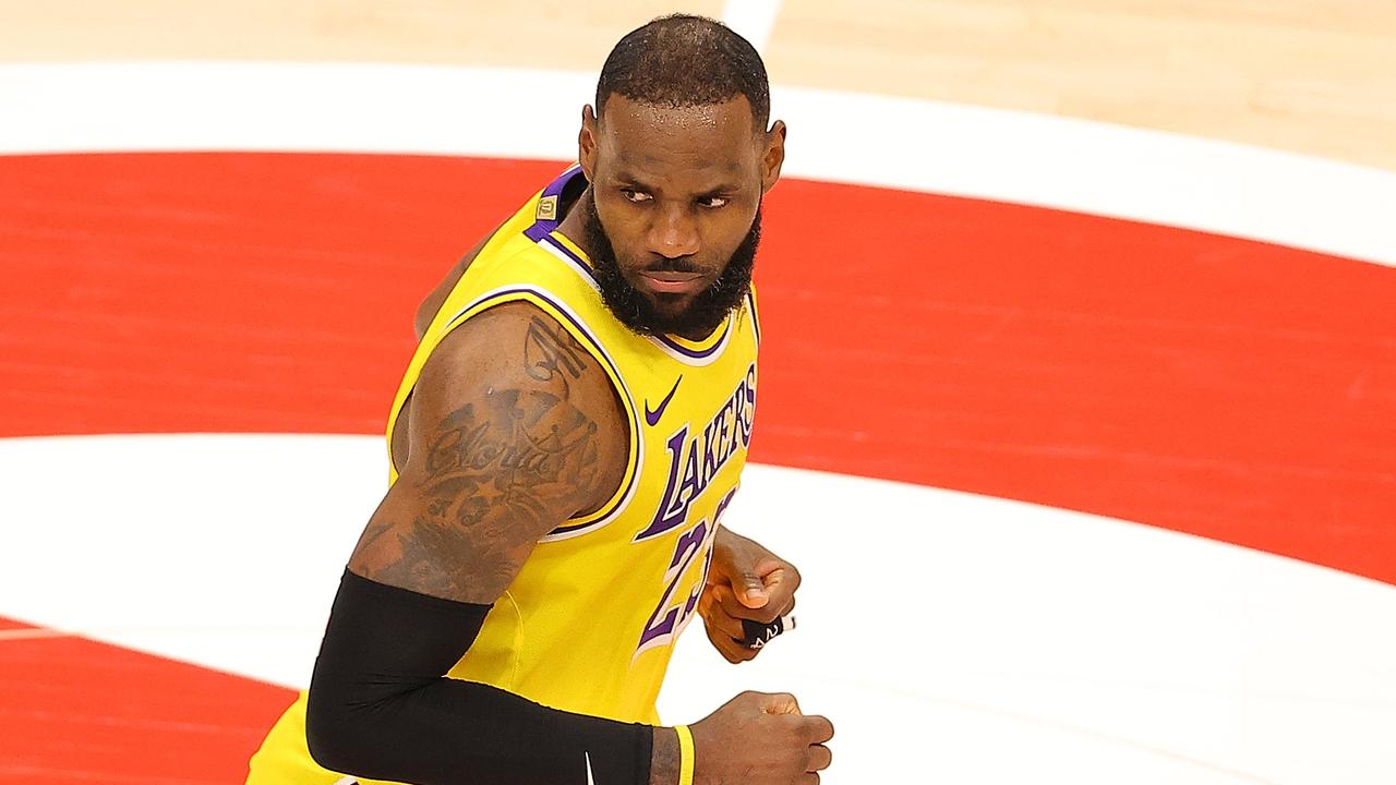 LeBron James was involved in a fiery exchange with two abusive fans on the sideline.