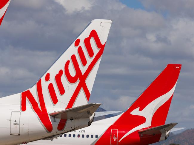 Townsville, Queensland - 28 July 2021: Virgin Australia and Qantas tails on display at Townsville Airport in far North Queensland27 October 2024Kendall HillPhoto - Getty Images