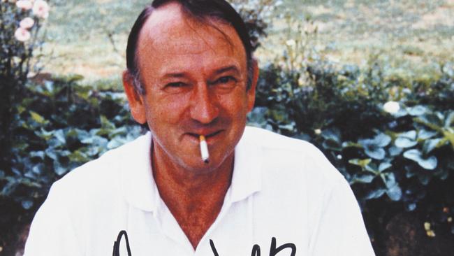 Undated copy photo of cricket legend Doug Walters smoking a cigarette in a picture at his home in Carlingford, Sydney. Picture: Ella Pellegrini