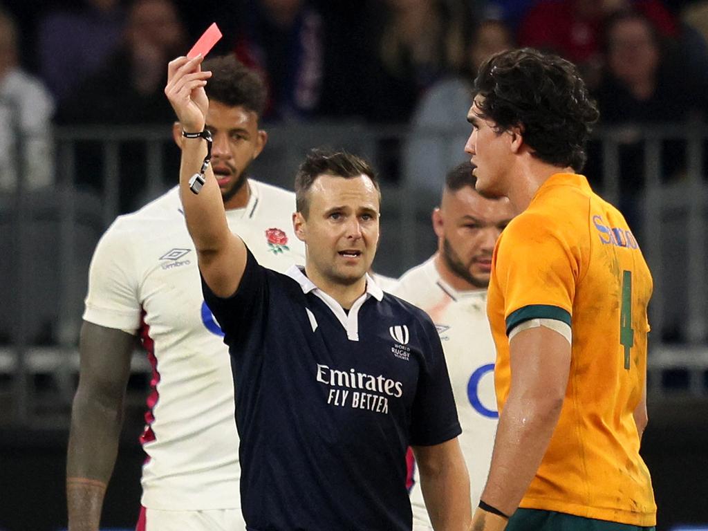 Referee James Doleman shows a red card to Australia's Darcy Swain in Perth. Picture: AFP