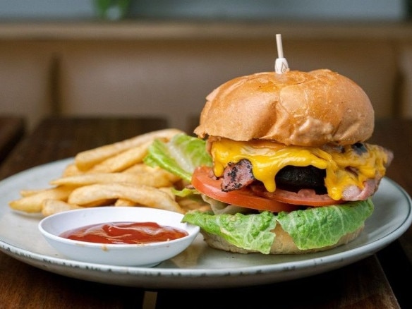 Enjoy a burger and chips at Skinny Dog Hotel.