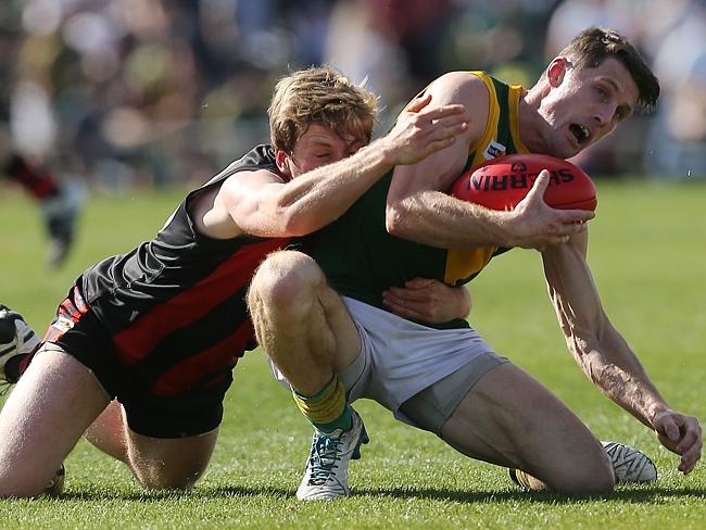 Gippsland Football League Grand Final match between Maffra Eagles and Leongatha Parrots. Maffra became the 2016 premiers, defeating Leongatha 13.10 (88) to 9. 16 (67). Jackson Scott and Brenton Fitzgerald battle it out. Picture: Yuri Kouzmin