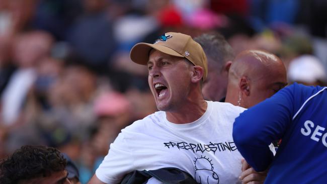 The protester was trying to get his message across. (Photo by Graham Denholm/Getty Images)