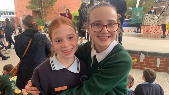 Georgia with one of her sisters at school. Picture: Supplied