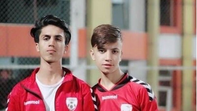 Zaki Anwari, left, with a friend and teammate after a game. Picture: WSJ