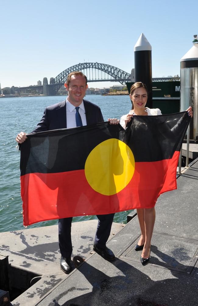 Cheree Toka, pictured with Inner West mayor Darcy Byrne, has been campaigning to have the indigenous flag permanently perched atop the Harbour Bridge for years. Her petition has amassed over 130,000 signatures to date. Picture: Supplied.