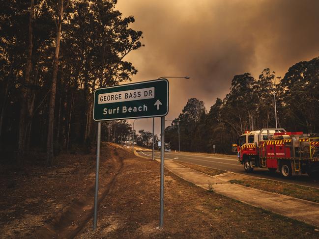 Pictured is the bushfire behind surf beach and sunshine bay on George Bass Drive at Batemans Bay. Picture: Josh Burkinshaw