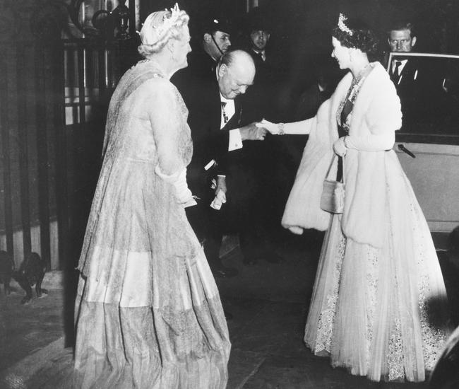 Prime minister Sir Winston Churchill and Clementine (left) farewell Queen Elizabeth II as she leaves a dinner at 10 Downing Street in London on April 4, 1955.