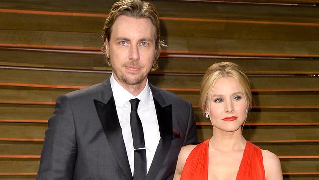 Dax Shepard (L) and Kristen Bell attend the 2014 Vanity Fair Oscar Party.