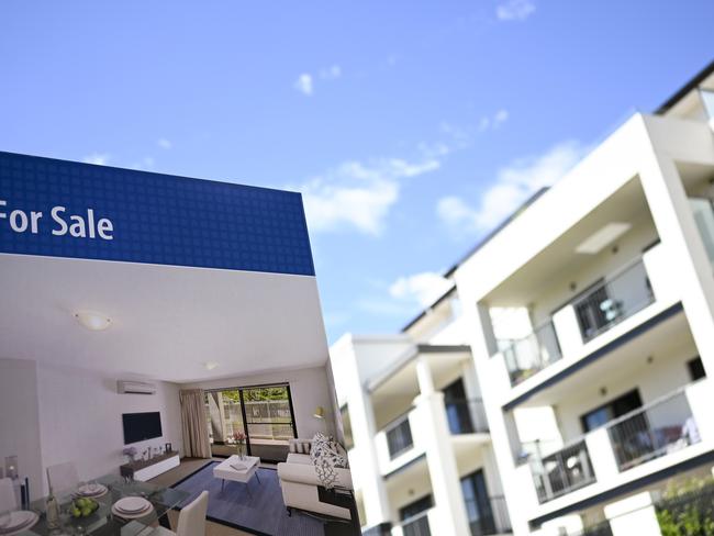 A real estate advertising board is seen next to a house in Canberra, Friday, March 1, 2019. (AAP Image/Lukas Coch) NO ARCHIVING