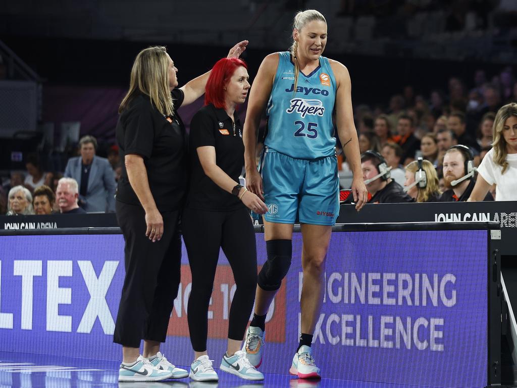 Lauren Jackson of the Flyers leaves the court injured. Picture: Daniel Pockett