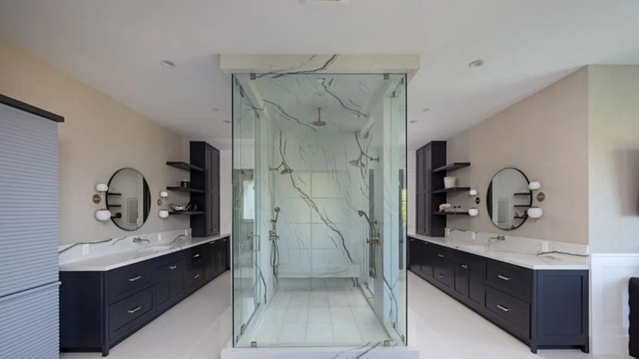 Double vanities and double-door shower in the main bathroom. Picture: Realtor.com