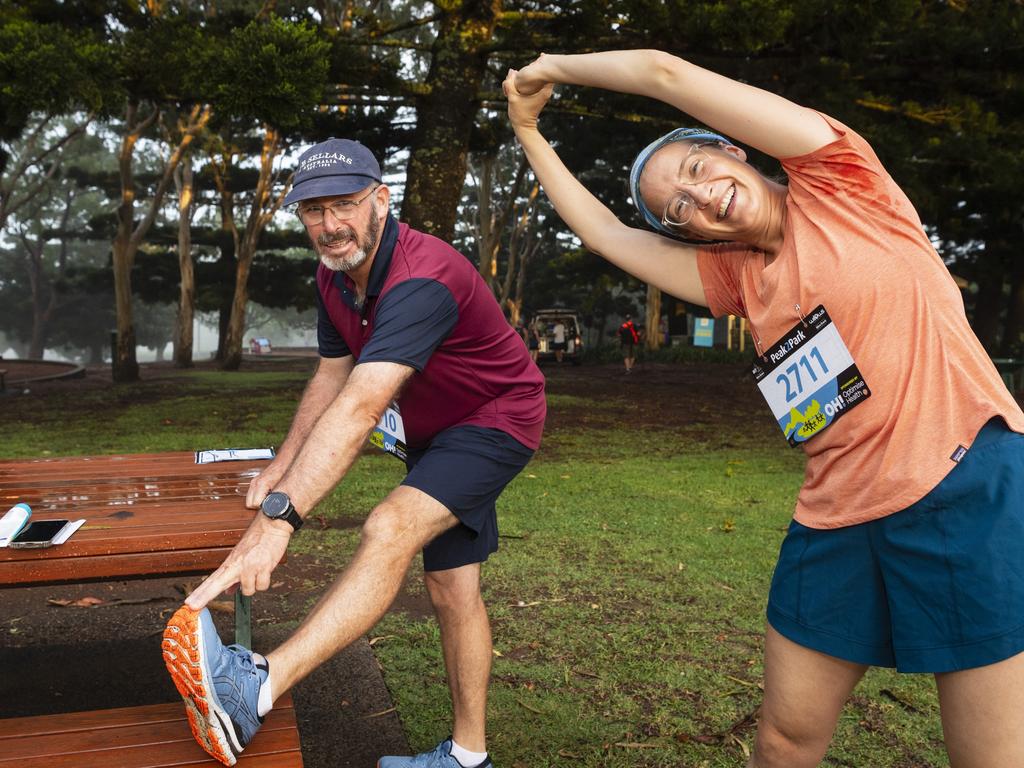 Team TAS members Tom Bradbury and Katey Parker warm up before Peak2Park, Sunday, March 3, 2024. Picture: Kevin Farmer