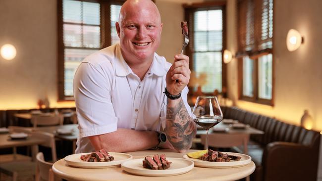 Chef Jamie Gannon, taste-tests the supermarket steaks, at Woolly Bay Hotel, Woolloomooloo. Picture: Picture: Justin Lloyd.