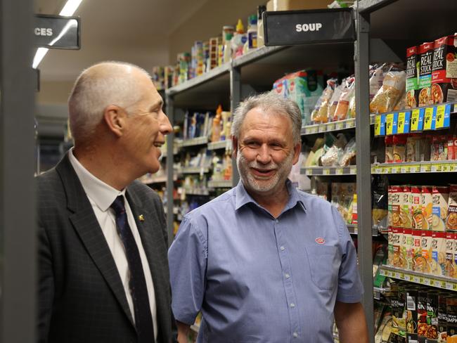 Minister for Energy and Renewables Nick Duigan and Lindisfarne IGA owner Brett Mackay in Lindisfarne IGA on Tuesday, October 29, 2024.