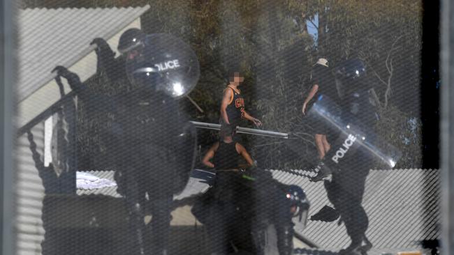 Detainees and riot police clash during a 21-hour brawl at the Frank Baxter Youth Justice Centre in 2019. Picture: Dean Lewins/AAP