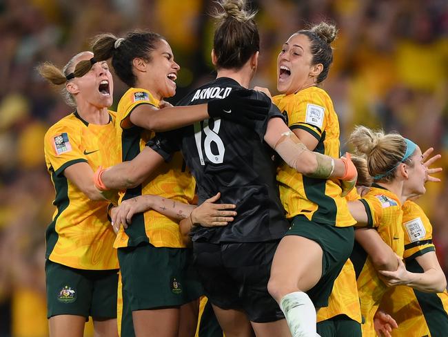 BRISBANE, AUSTRALIA - AUGUST 12: Australia players celebarate their victory through the penalty shoot out during the FIFA Women's World Cup Australia & New Zealand 2023 Quarter Final match between Australia and France at Brisbane Stadium on August 12, 2023 in Brisbane, Australia. (Photo by Justin Setterfield/Getty Images)