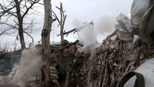 A Ukrainian serviceman fires an RPG towards a Russian position at the frontline in the Donetsk region this week. Picture: AFP